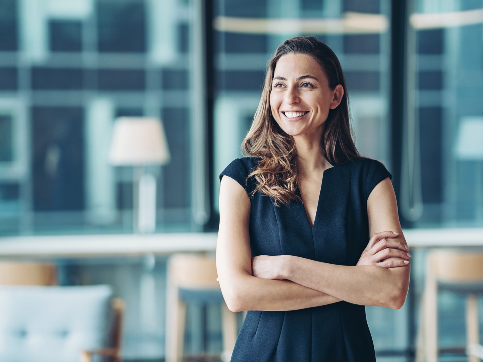 A professional standing in a modern office