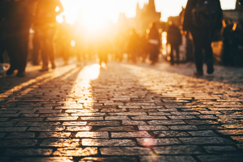 Busy European street at the sunset